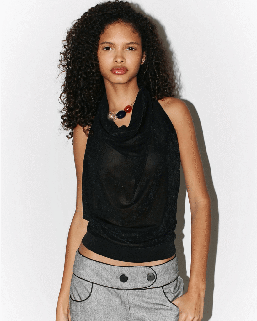 Product shot showcasing the details and craftsmanship of Coloma's Top backless.