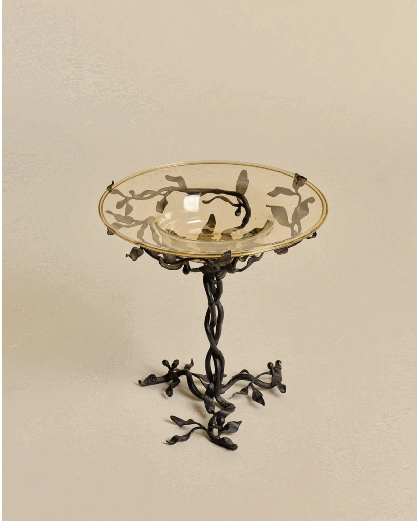a glass bowl on a stand
