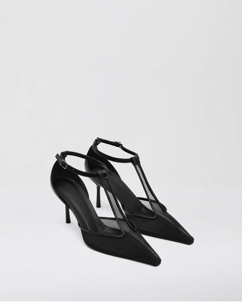 a pair of black high heeled shoes