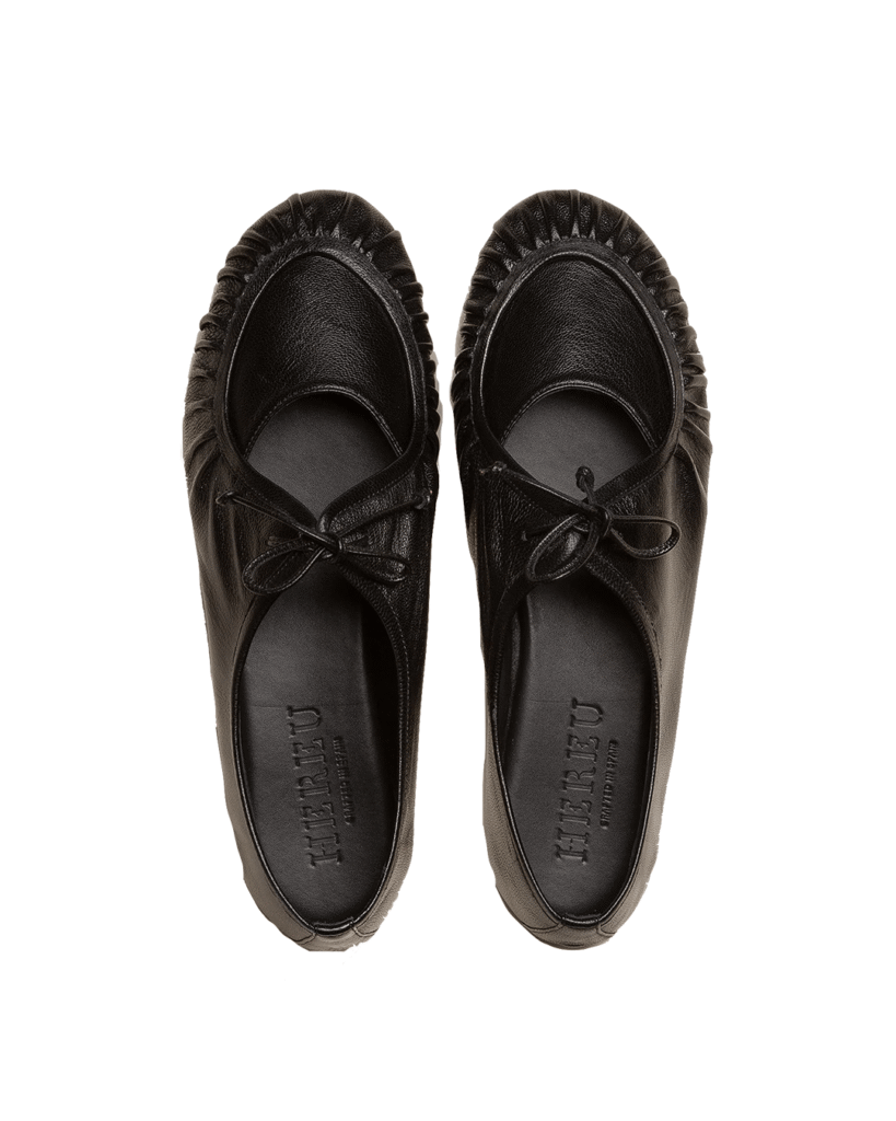 Hereu- Flat lace-up shoe with pleated front detail, crafted in supple shiny lambskin. Made in Spain by uniquely talented artisans, celebrating excellence in craftsmanship.